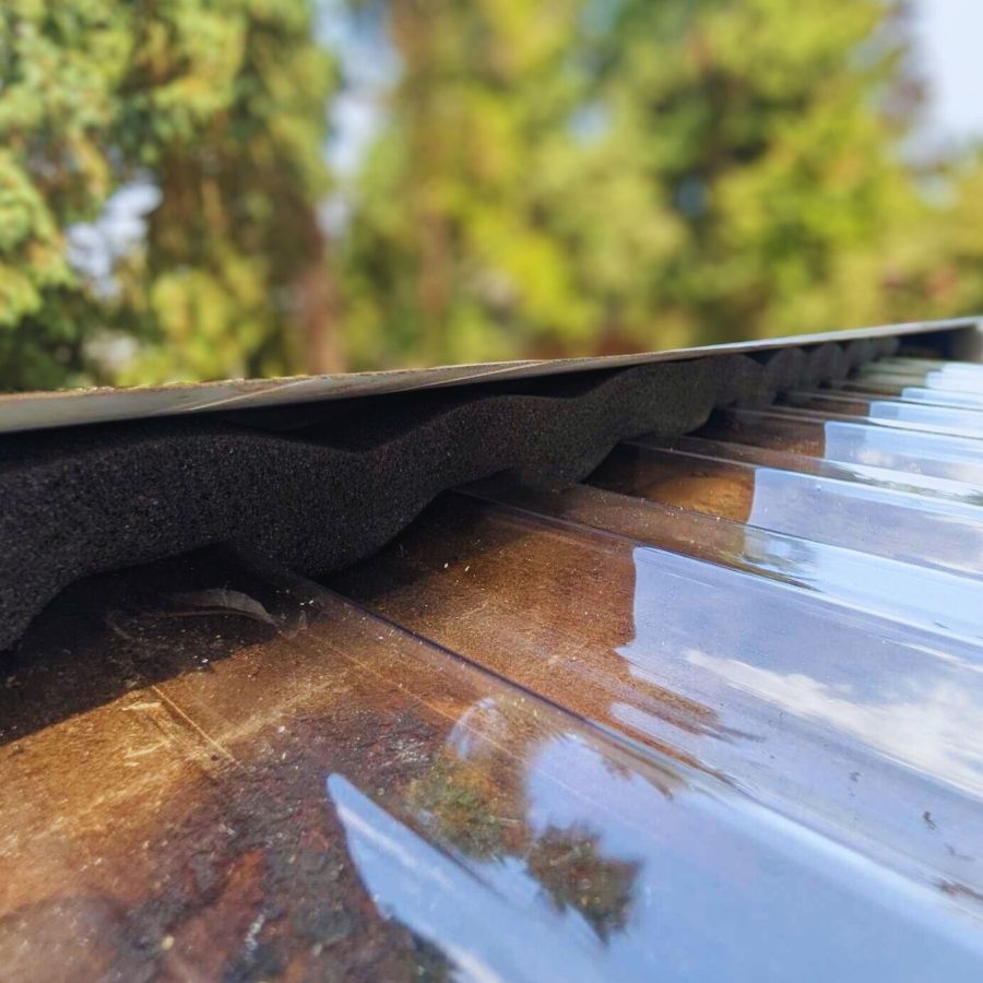 image shows poly carb roofing seam during roof damage inspection