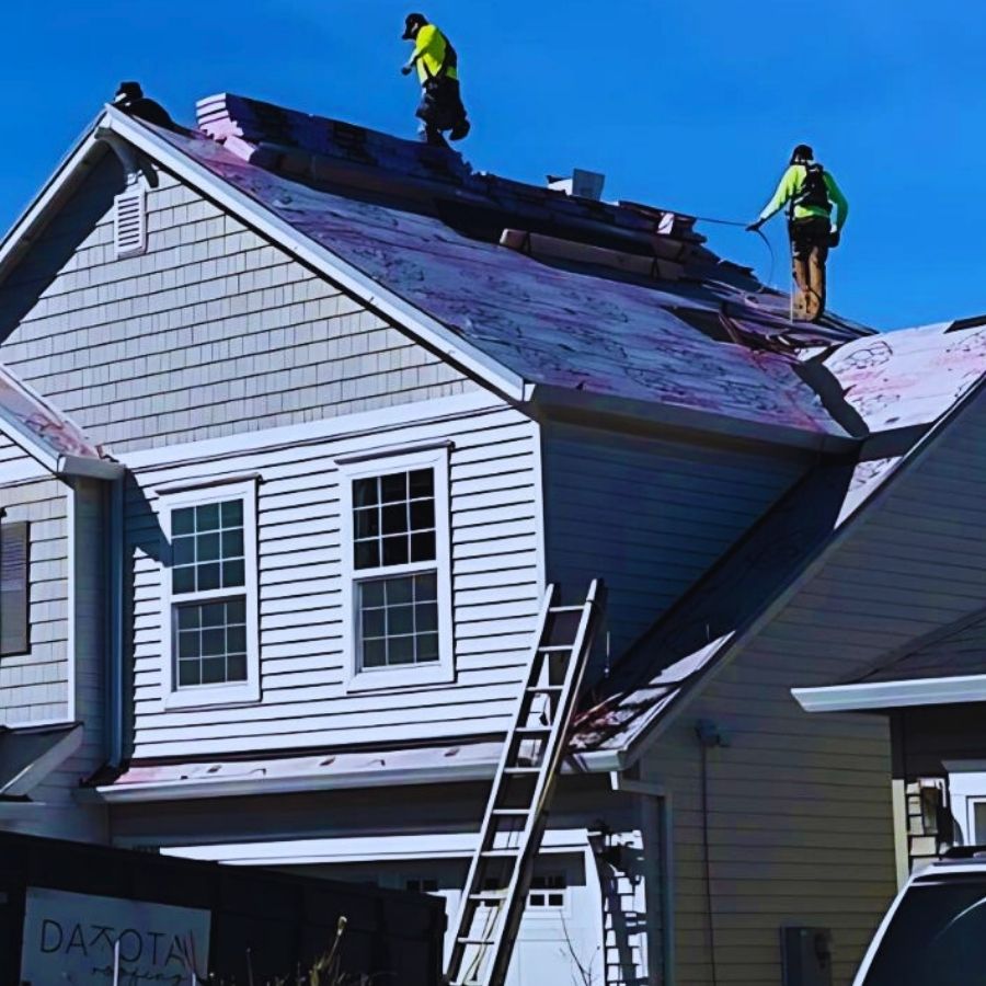 a roofing crew on an Oregon in the middle of new shingle roof installation
