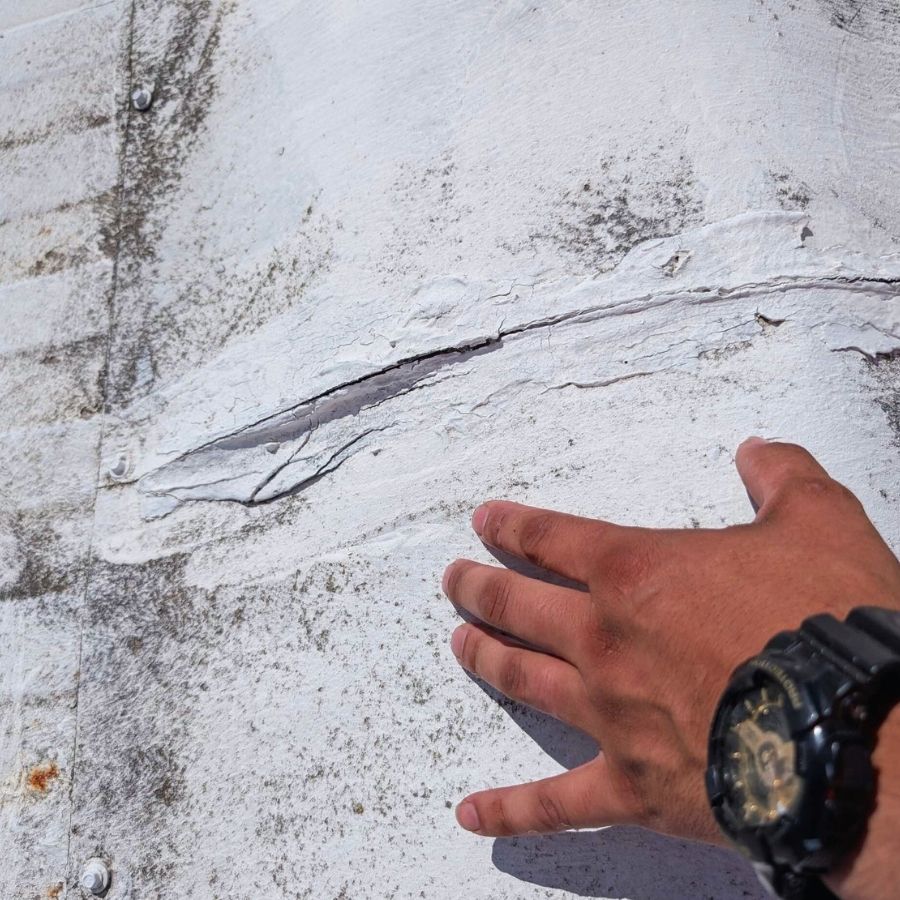 degrading TPO on a Oregon roof showing cracks
